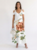 Camila | Vestido largo de corte A con estampado floral y hombros descubiertos